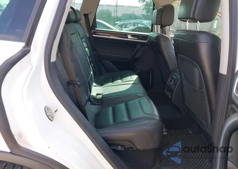 2013 Volkswagen Touareg Tdi Lux z USA, uszkodzony, nr VIN WVGEP9BP7DD006100